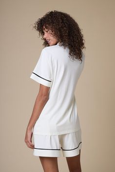 Slip into magnificently soft, four-way stretch cotton. Developed with anti-pilling and zero sagging qualities to last wear after wear. Fitted Cotton V-neck Sleepwear, Classic White Cotton Sleepwear, Sporty White Top For Daywear, Fitted Cotton Sleepwear For Relaxation, Cotton Short Length Tops For Loungewear, Short Length Cotton Tops For Loungewear, Comfortable Cotton Tops For Daywear, Cotton Stretch Sleep Top, Cotton Stretch Short Sleepwear