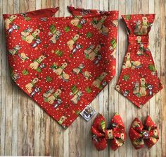 a red dog bandana and matching tie with matching bow ties on wooden flooring