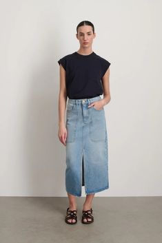 A classic calf length skirt in a slim fit, cut from our classic indigo dyed cotton denim that has been stone washed for a chic casual everyday feel. Classic Blue Mid-rise Denim Skirt, Workwear Denim Skirt With Relaxed Fit, Relaxed Fit Denim Skirt For Work, Classic High Rise Blue Denim Skirt, Relaxed Fit Denim Skirt In Medium Wash For Work, Classic Cotton Denim Skirt, Relaxed Fit Medium Wash Denim Skirt For Work, Medium Wash Relaxed Fit Denim Skirt For Work, Workwear Cotton Denim Skirt In Medium Wash