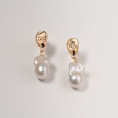 A romantic style of drop baroque pearl earrings with simplicity and elegance. These earrings are crafted with thick plated 18K gold or sterling silver accessories that can last with proper care. It's perfect for your nature day or black-tie event. A perfect gift for your loved one. I handpick these pearls DIRECTLY from freshwater oyster farms that are definitely high-quality with AAAA luster and minimal imperfections. The metal accessories are high-quality Vermeil with 18K gold, which is sensitive skin-friendly. They are thick plated with updated technology that can last longer than traditional gold-plating. My earrings have been exposed to air for 2 years and they are not tarnished at all yet. Color: White with pink and purple reflection Pearl dimension: width approx. 14-16mm and length a Minimalist Baroque Pearl Earrings For Formal Occasions, Minimalist Teardrop Baroque Pearl Earrings, Minimalist Baroque Pearl Teardrop Earrings, Minimalist Baroque Pearl Dangle Earrings, Minimalist Baroque Pearl Earrings With Pearl Charm, Minimalist Baroque Pearl Drop Earrings, Formal White Baroque Pearl Earrings, Minimalist Baroque Pearl Earrings In Pearl White, Minimalist Baroque Pearl White Pearl Earrings