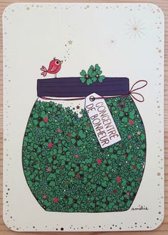 a card with a pot full of clovers and a bird on top