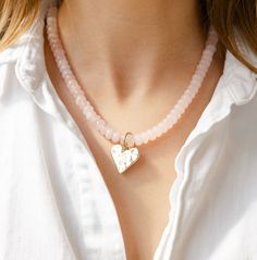 16.5” rose quartz with gold hammered heart in the middle! Rose Quartz Heart Pendant Necklace With Charm, Girl Tribe, Jewelry Studio, Boutique Accessories, Gemstone Necklace, In The Middle, Online Jewelry, The Middle, Rose Quartz