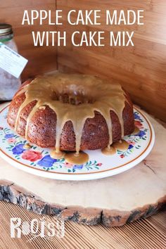 a bundt cake sitting on top of a plate covered in icing