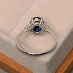 Sapphire engagement ring blue sapphire engagement ring oval | Etsy Elegant Silver Sapphire Oval Ring, Elegant Silver Sapphire Ring In Oval Shape, Elegant Oval Sapphire Ring In Silver, Oval Sapphire Promise Ring, Oval Sapphire Promise Ring In 14k White Gold, Classic Silver Sapphire Ring With Oval Cabochon, Classic Silver Sapphire Ring With Lab-created Sapphire, Elegant Oval Sapphire Ring In Sterling Silver, White Gold Oval Sapphire Ring