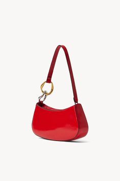 The Ollie Bag is a mini shoulder bag made out of polished leather. This style features a hardware design on the strap and a zip closure. Mixed Metal Hardware, Carrot Colour, Mink Colour, Keds Champion, Sandal Platform, Novelty Bags, Crossbody Clutch, Wedge Sneakers