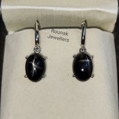 BAND- ROUNAK JEWELLERS MATERIAL- 925 STERLING SILVER GEMSTONE - NATURAL BLUE STAR BLACK STAR STONE WEIGHT - 17.05 CT BLACK STER STONE SIZE - 10 X 14 MM EARRINGS WEIGHT - 7.050 GM STONE SHAPE - OVAL GEM COLOUR - BLACK PLEASE GIVE YOUR OPENION OR FEEDBACK ABOUT THE PRODUCT. WE ACCEPT BULK ORDER ALSO. https://www.etsy.com/in-en/shop/RounakJewellers?ref=search_shop_redirect Black Dainty Earrings, Classy Lifestyle, Star Black, Jewelry Bridesmaid, Earrings Dainty, Wedding Jewelry Earrings, Earrings Minimalist, Dainty Earrings, Black Star