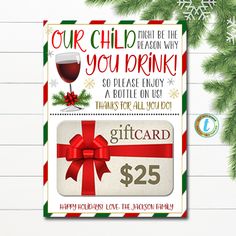 a christmas gift card with a red ribbon and wine glass on the front that says our child be the reason why you drink so please enjoy a bottle