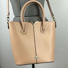 Nwot Antonio Melani Blush Leather Tote Bag. Self-Carry Handles And Detachable Adjustable Strap. Roomy Open Interior With Zippered Pocket And Open Pocket. 100% Polyester Lining. Perfect Condition. Smokefree Home. Classic Blush Shoulder Bag For Formal Occasions, Blush Shoulder Bag With Gold-tone Hardware, Classic Blush Leather Shoulder Bag, Elegant Blush Shoulder Bag With Gold-tone Hardware, Formal Blush Bag With Gold-tone Hardware, Feminine Cream Bag For Shopping, Feminine Cream Bags For Shopping, Formal Blush Shoulder Bag With Gold-tone Hardware, Versatile Beige Satchel With Gold-tone Hardware