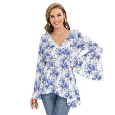 Elevate your style with our Purple Flower Women's V-neck Blouse with Flared Sleeves! This chic blouse features a deep V-folded collar and a stunning butterfly sleeve design, perfect for adding a touch of elegance to any outfit. Made from 100% polyester, the fabric is lightweight and breathable, ensuring comfort and style in one beautiful piece. Key Features: Material: 100% polyester for a soft, comfortable feel Design: Deep V-neck and flared sleeves for a fashionable silhouette Fit: Regular fit, Feminine Flowy V-neck Top, Flowy V-neck Blouse With Floral Print, Spring Casual Flowy V-neck Top, Casual Flowy V-neck Top, Spring Floral Print V-neck Blouse, Flowy V-neck Top For Spring, Flowy V-neck Feminine Tops, Spring Floral Print V-neck Tops, Floral Print V-neck Top For Spring