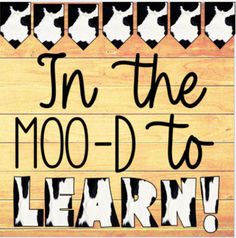 a wooden sign that says in the moo - d to learn with black and white letters