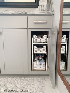 the bathroom is clean and ready to be used as a storage area for toiletries