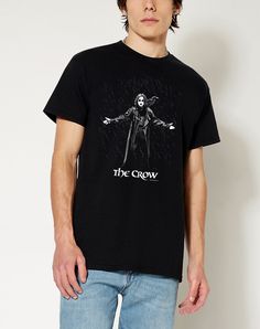 Add a fresh new look to your casual outfit by adding this The Crow Rain T Shirt to your wardrobe. Add this cool t shirt to any casual outfit and you'll always be looking fantastic and showing your fandom for The Crow. Officially licensed Crewneck Short sleeves Material: Cotton Care: Machine wash; tumble dry low Imported This shirt is Unisex Sizing only For a fitted look, order one size smaller than your normal size Note: This item is print to order and may have a 1-2 day extra processing time Band Merch Tops With Front Print For Fan Conventions, Fandom Crew Neck Top For Streetwear, Cotton T-shirt With Character Print For Fans, Cotton Shirt With Character Print For Fans, Halloween Crew Neck Tops With Band Logo, Band Merch Cotton Tops For Fan Conventions, Relaxed Fit Fan Merchandise Shirt In Pop Culture Style, Band Logo Crew Neck Tops For Fans, Cotton Fandom Short Sleeve Tops