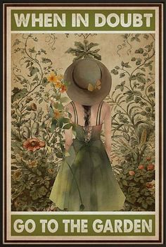 a woman in a green dress and hat with flowers