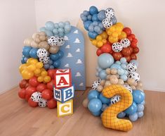 balloons are arranged in the shape of letters and numbers