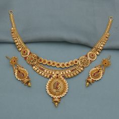 Discover the allure of Handmade Gold Jewelry at https://morvijewels.etsy.com/   Get a dazzling 25% off on all our 22k and 18k gold pieces. Don't miss out on this limited-time offer. Shop now and embrace the radiance of gold! Metal - Yellow Gold Purity- 22 Karat Yellow Gold Weight- 30.39 grams approx Necklace - 8.25 inches long, Middle Size- 4.8*2.6 cm  Earrings - 4.6 cm long, 1.6 cm width Click For More  https://www.etsy.com/in-en/shop/morvijewels?ref=seller-platform-mcnav Click here  https://morvijewels.etsy.com/    to get more discount and offers Happy to take wholesale bulk orders. Yellow Gold Bridal Necklace With Meenakari, 22k Gold Dual-tone Temple Jewelry, 22k Yellow Gold Chandbali Kundan Necklace, 22k Gold Dual-tone Jewelry For Celebrations, 22k Gold Meenakari Jewelry For Puja, Dual-tone 22k Gold Jewelry For Celebrations, Dual-tone 22k Gold Jewelry For Festivals, Gold Hallmarked Kundan Necklace For Diwali, Gold Dual-tone Jewelry For Puja