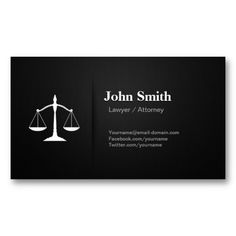 a black business card with an image of a scales of justice on the front and bottom