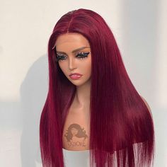 Transform your look with the 99J lace front wig from SISDORE. This burgundy hair wig had a 150% hair density and was made of virgin human hair. Straight and body wave textures are available from 16-24 inches. The 13x4 lace front wig design (ear to ear hand-tied) ensures a seamless, natural-looking hairline, providing both style and comfort. Perfect for any occasion, this wig is easy to style and maintain. Brand SISDORE® Wig Type 13x4 Lace Front Wig Hair Material Brazilian Virgin Hair Hair Length Brazilian Hair Wigs, 13x4 Lace Front Wig, Long Human Hair Wigs, Red Wigs, Burgundy Hair, Body Wave Hair, Front Lace Wigs Human Hair, Hair Density, Straight Human Hair