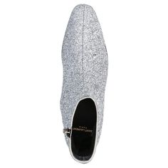 Saint Laurent's latest collection is full of glitter-finished shoes in mod silhouettes. With a manageable block heel, these stunning silver ankle boots will put a glam-rock spin on day or night looks.Almond toeAnkle lengthLow block heelGlitter details.Silver glitter-finished leatherCovered heel measures approximately 40mm/ 1.5 incheZip fastening along sideMade in Italy Formal Silver Sparkling Boots, Glamorous Metallic Silver Evening Boots, Silver Sparkling Boots For Formal Occasions, Metallic Silver Pointed Toe Formal Boots, Silver Glitter Boots With Pointed Toe, Silver Glitter Pointed Toe Boots, Silver Glitter Party Boots, Metallic Silver Evening Boots With Round Toe, Silver Ankle Boots