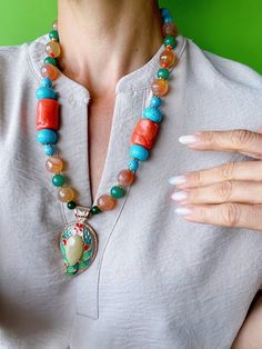 Colorful Beaded Turquoise Pendant Necklace, Large Tibetan Coral Agate Beads Necklace, African Chunky Gemstone Necklace, Gifts for Her Unique bohemian necklace for a special woman. ✴ WOULD YOU LIKE TO HAVE A STRIKING ACCESSORY TO ELEVATE YOUR LOOK IN A SINGLE GESTURE? This accessory will add value to the casual, most neutral looks and more elaborate compositions, allowing them to be elevated to another level. This is a one-of-a-kind handcrafted piece that every confident and empowered woman deser Turquoise Pendant Beaded Necklace For Meditation, Turquoise Gemstone Beads Pendant Crystal Necklace, Handmade Turquoise Jade Beaded Necklaces, Turquoise Jade Beaded Necklaces As Gift, Turquoise Jade Beaded Necklaces For Gifts, Turquoise Jade Beaded Bohemian Necklace, Bohemian Turquoise Jade Beaded Necklaces, Turquoise Agate Round Beads Gems And Cabochons, Turquoise Agate Round Beads, Gems And Cabochons