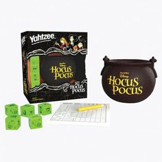 Bring fun and magic to a full rolling bubble with this bewitching twist on America's #1 Dice Game! Inspired by the classic Halloween comedy, YAHTZEE: Disney Hocus Pocus lets players "Shake, Roll, and Shout" spells and ingredients from Winifred's evil book with a custom cauldron dice cup to mix Dash of Pox, Dead Man's Toe, and more into winning combinations! For 1 or more players, ages 8+. Size: 6.13" x 5.25".  Color: Multicolor. Halloween Board Game, Hocus Pocus Disney, Disney Board Games, Yahtzee Game, Hocus Pocus Witches, Dice Cup, Disney Games, Classic Halloween, Disney Food Blog