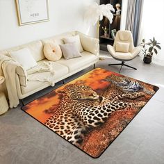 a living room with two couches and a rug that has a leopard on it