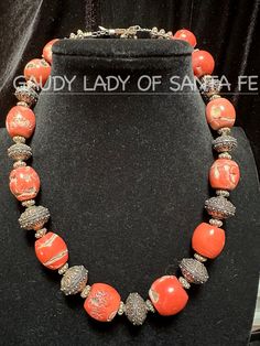 Vintage Bamboo Peach Coral Necklace with old, fancy Sterling Silver bead.  21 inch. 9.0 oz.  I can polish the silver to make it look like new upon request. SEE MATCHING BRACELET. FREE SHIPPING:  SEE this and other pieces not shown here at gaudyladyofsantafe.com Orange Jewelry With Silver Beads For Gift, Orange Jewelry With Silver Beads As A Gift, Elegant Orange Necklace With Spacer Beads, Traditional Orange Jewelry With Silver Beads, Traditional Silver Beaded Necklace For Formal Occasions, Traditional Orange Jewelry With Spacer Beads, Antique Silver Jewelry With Polished Beads, Antique Silver Beaded Round Necklaces, Antique Silver Beaded Necklace For Gift