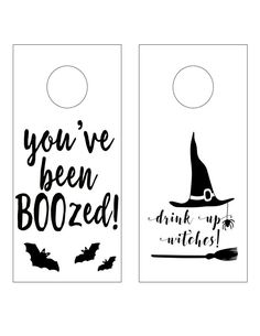 two door hangers that say you've been boozed and drink up witches