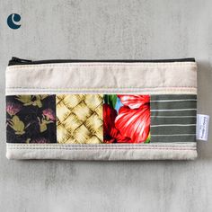 Spice up your pencil case game with our Oyster Taro Patchwork Pencil Cases. The oyster colored pencil case with a colorful patchwork accent adds a touch of fun to your stationery collection. The slim zippered pouch makes it easy to carry all your writing essentials (and maybe a few extra items). This listing is updated regularly with available pencil cases. Shown pencil case is a sample only. Patchwork print pattern will be the same, zipper colors may vary. No two pencil cases are the same. Prod Multicolor Rectangular Pencil Case For Everyday Use, Rectangular Multicolor Pencil Case For Everyday Use, Beige Pencil Case With Pen Holders As Gift, Rectangular Beige Pencil Case For Everyday Use, Beige Zipper Pencil Case As A Gift, Beige Pencil Case With Zipper As Gift, Multicolor Rectangular Pencil Case For Gift, Multicolor Pencil Case For Daily Use, Multicolor Pencil Case With Pen Holders For Everyday