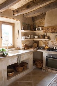 a kitchen filled with lots of counter space next to a stove top oven and sink