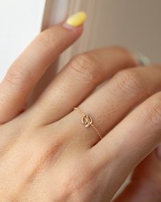 Dainty 14K Initial Letter Ring: Barely there ring in 14k Gold with a small script Letter Modern and timeless Super Dainty Link Chain Ring Simple, minimalist everyday Alphabet Initial Ring - Perfect as a stacking ring or by itself. • Each initial measures approx. 4.8mm• Available in 14K Yellow Gold, 14K White Gold • SIZE: US4.5 - 10• Letter: A-Z or an heart charm * Leave us your initial in the comment box at checkout. Simple Yellow Gold Initial Ring For Anniversary, 14k Gold Simple Initial Promise Ring, Dainty Tiny Initial Ring In 14k Gold, Tiny Dainty 14k Gold Initial Ring, Dainty 14k Gold Tiny Initial Ring, Delicate 14k Gold Initial Ring For Everyday, Simple 14k Gold Initial Ring, Minimalist Yellow Gold Stackable Rings With Initials, Dainty 14k Gold Stackable Rings With Initials