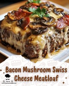 bacon mushroom swiss cheese meatloaf on a white plate with the title above it