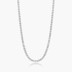 Always in style, this classic tennis necklace shines bright thanks to a row of dazzling diamonds. Pair it with a casual look for extra elegance or wear it as the perfect accessory to a black tie event. This piece looks good no matter where you wear it. Diamond Tennis Necklace, Diamond Jewelry Necklace, Tennis Necklace, Black Tie Event, Fine Jewellery Necklace, Lab Created Diamonds, Shine Bright, Black Tie, Diamond Shapes