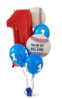 some balloons and baseballs are in the air