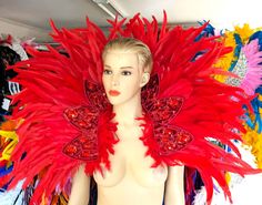 We make and ship our items really fast if you need it for a specific date please let us know.  or call/text us at 954-3051817 to complete your order over the phone Red Feather Collar with Silver trim Rocketman inspired Cocktail feathers Wings Inspired by Elton John movie rocket man very light and easy to wear Please Read :  We are happy to answer any questions you may have regarding any item you are considering in buying. Each item is handmade to order,  therefore we have a Strict No Returns Pol Cosplay For Men, Rocketman Movie, Types Of Feathers, Feather Collar, Red Cocktails, Feather Wings, Sequin Appliques, Red Feather, Beaded Applique