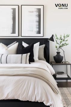 A sleek monochrome bedroom featuring a black headboard, stylish pillows, and abstract artwork. The minimalist nightstand with a simple vase and greenery adds a touch of nature to the sophisticated decor. Neutral Bed With Black Accents, Neutral Monochrome Bedroom, Black And Natural Bed, Black White Natural Bedding, Neutral Bedding Black Bed, Nightstand Decor Modern, Neutral Bedding Black Headboard, Monochrome Bedroom Ideas, Black And Cream Bedroom Ideas