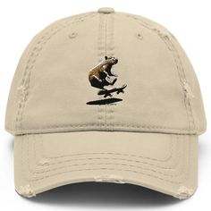 This is a Capybara Embroidered Distressed Dad Hat, Capybara Lover Gift, Funny Capybara Gift Hat, Handmade Embroidered Adjustable Unisex Baseball Cap! You'll love this Capybara Skateboarding Dad Hat, Embroidered, Distressed, in Tan, Navy Blue, and Charcoal Grey, Funny Meme Cap for Men and Women! As seen on Tiktok, Capybara memes are going viral - they're super popular! This logo of a capybara doing a kickflip on a skateboard is embroidered with high-quality stitching. This is a distressed dad hat, so it's extra stylish! It comes in tan, navy blue, and charcoal grey, and it's adjustable - one size fits all! Great for teens who like capybaras or skateboarding or funny memes! Product features: 100% pre-shrunk cotton twill Unstructured 6-panel cap with a low profile Soft crown 6 sewn eyelets 4 Casual Flat Brim Hat For Skateboarding, Casual Snapback Hat With Curved Brim For Skateboarding, Casual Curved Brim Snapback Hat For Skateboarding, Casual Flat Bill Trucker Hat For Skateboarding, Casual Curved Brim Baseball Cap For Skateboarding, Casual Flat Bill Baseball Cap For Skateboarding, Casual Snapback Baseball Cap For Skateboarding, Casual Skateboarding Cap, Adjustable Cap For Skateboarding