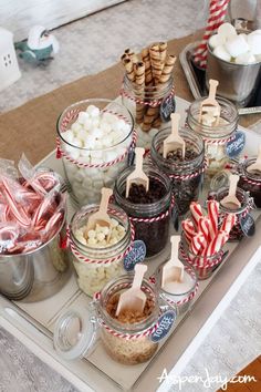 Elevate your holiday gatherings with a festive hot chocolate bar! Discover easy tips for setting up a cozy station complete with toppings, mix-ins, and seasonal decor. From marshmallows to candy canes and whipped cream, your guests will love creating their own custom cups of cocoa. Perfect for holiday parties or family nights! Christmas Hot Chocolate Station, Dessert Smoothies, Cocoa Bar Ideas, Hot Cocoa Bar Ideas, Hot Chocolate Bar Party, Perfect Hot Chocolate, Cocoa Station, Cozy Hot Chocolate, Chocolate Bars Gift