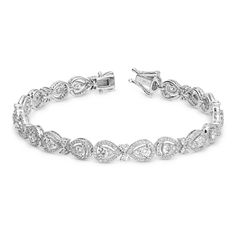 18K White Gold Halo Set Pear Shaped Tennis Bracelet 
Unique yet timeless look just for her, this 2.95 ct. t.w. diamond tennis bracelet is certain to take her breath away. Fashioned in 18K white gold, this timeless design features a brilliant array of shimmering halo-set pear shaped diamonds arranged in a series of links. A sophisticated style, this bracelet is buffed to a polished shine and secures with a tongue and groove clasp
2.95 carat pear shape tennis bracelet
18K white Logo Board, Solitaire Bracelet, Sparkling Jewelry, Diamond Pendants Designs, Jewellery Design Sketches, Jewelry Designing, Jewelry Staples, Bracelet Diamond, Fine Diamond Jewelry