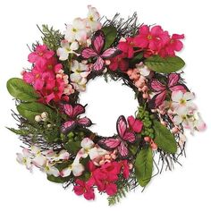 a wreath with pink and white flowers on it