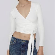 Size L Fitted Wrap Top For Brunch, Trendy Fitted Wrap Top For Fall, Trendy Wrap Crop Top For Spring, Trendy Spring Wrap Crop Top, Fitted Long Sleeve Wrap Top For Brunch, Fitted Cropped Wrap Top For Spring, Chic Cotton Wrap Top For Spring, White Wrap Top For Spring, Trendy Spring Wrap Top