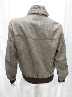 Scotch pattern Racer Jacket. Brown cuffs and waistband. Front button-flap pockets. Back yoke. Liner You will not find this collection in any other store. We only have a few left in stock. Mannequin is 5' 8" (175.26 cm), US size 4 wearing a US size 8 jacket. TOP HALF US Size 2 4 6 8 10 12 Bust (in.) 31.5 33 34.5 36 38.5 40 UK Size 6 8 10 12 14 16 Bust (cm) 80 84 88 92 98 104 Brown Collared Outerwear With Button Cuffs, Single Breasted Sport Coat With Stand Collar For Fall, Winter Long Sleeve Tweed Jacket With Button Cuffs, Fitted Long Sleeve Tweed Jacket With Button Cuffs, Fitted Tweed Jacket With Button Cuffs, Single-breasted Sport Coat With Stand Collar For Fall, Winter Tweed Jacket With Button Cuffs, Fall Single Breasted Sport Coat With Stand Collar, Fall Sport Coat With Pockets And Stand Collar