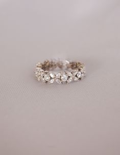 a close up of a ring on a white surface