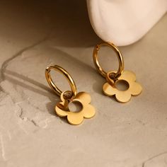 Set yourself apart with these one-of-a-kind Time To Bloom Floral Earrings. Blossoming with 18k gold plating, these earrings are sure to make heads turn. Get ready to turn up the glamour and take your look to the next level! Material: 18K Gold Plated over Stainless Steel. Finished with anti-tarnish processing (allergic skin safe + nickel and lead-free). Does not tarnish. Floral Earrings, Gold Plated Silver, 18k Gold, Gold Plate, Turn Ons, Floral, Gold, Silver