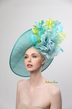 "Large derby fascinator made on of Aqua/Turquoise sinamay base with a large silk organdy rose and aqua/lime feathers. Seated on a velvet headband. All my hats are hand made to order, please allow 1-2 weeks, if this is a rush order, please contact me first This hat doesn't come with a hat box, doesn't fit in the 18\" box we have. Feel free to ask any questions All sales are final" Sinamay Fascinator For Kentucky Derby Races, Turquoise Wide Brim Hat For Kentucky Derby, Green Hat For Kentucky Derby Races, Green Hats For Kentucky Derby Races, Spring Turquoise Headpiece For Parties, Turquoise Headpiece For Kentucky Derby Races, Turquoise Headpieces For Kentucky Derby, Elegant Turquoise Hat For Spring, Fitted Turquoise Summer Hat