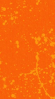 an orange background with yellow spots