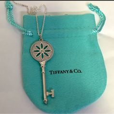 Tiffany & Co Daisy Key Pendant With Diamond Never Worn 16 Inches Chain Include ( No Dust Bag ) Retail Price $650 Only The Pendant In Small Size Tiffany And Co Jewelry, Tiffany And Co, Key Pendant, Tiffany Blue, Tiffany & Co., Diamond Pendant, Womens Jewelry Necklace, Dust Bag, Daisy