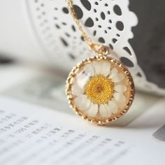 A natural inspired necklace made with a real flower resin cabochon and on a gold plate lace setting.  :: Chain measures 22.5 or 57cm long :: Charm measures 25mm approx Library Fashion, Resin Cabochon, Lace Necklace, Flower Resin, Inspired Necklace, Wedding Lace, Resin Necklace, Simply Lovely, Lace Weddings