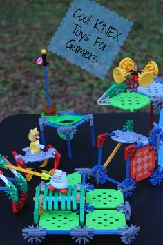 some toys are sitting on a table with the words cool knex toys for gamers