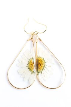 * Super lightweight * 18k Gold plated earring frames * 14k Gold plated earring hooks * Flowers handpicked and patiently dried with care * Lead and nickel free * Comes in a cute box to store in 🌼Care Instructions🌼 * Clean resin surfaces with a soft damp cloth as needed * Store in a clean dry area and avoid direct sunlight * Avoid solvents/oils/sharp objects/extreme heat If you have any questions or concerns please feel free to contact us :) 🌿Follow us on Social media🌿 Instagram: l.k_elegance Adjustable Teardrop Flower Earrings, Nature-inspired Teardrop Birth Flower Earrings, Nature-inspired Teardrop Earrings With Pressed Flowers, White Teardrop Flower Earrings, White Teardrop Hypoallergenic Flower Earrings, White Teardrop Flower Earrings Nickel Free, Nickel-free White Teardrop Flower Earrings, White Teardrop Nickel-free Flower Earrings, White Nickel-free Teardrop Flower Earrings