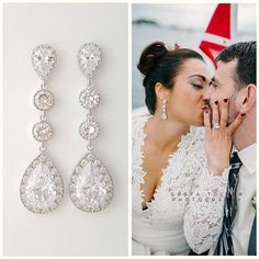 the bride and groom are kissing next to their wedding jewelry